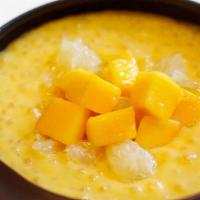 Mango Juice W. Sago And Pomelo 杨枝甘露 · Homemade mango juice with chopped mango, pomelo, and sago (mini bubbles). served cold in a 1...