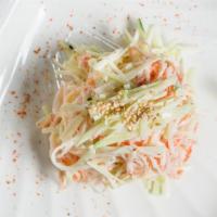 Kani Salad · Crabmeat and cucumber mixed with mayonnaise and flying fish roe.
