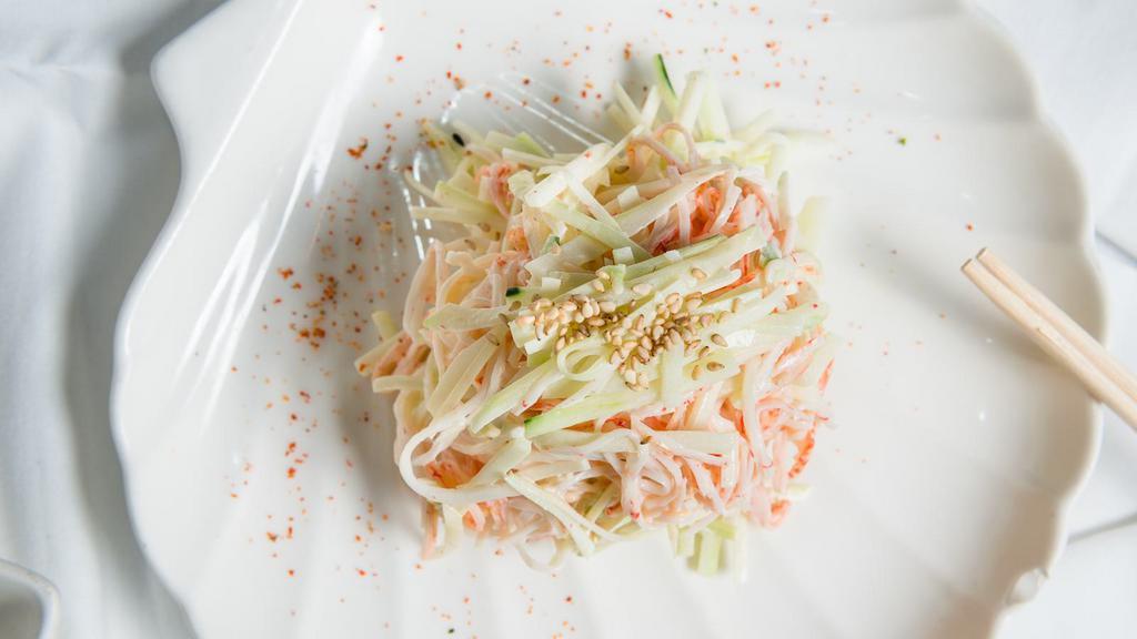 Kani Salad · Crabmeat and cucumber mixed with mayonnaise and flying fish roe.