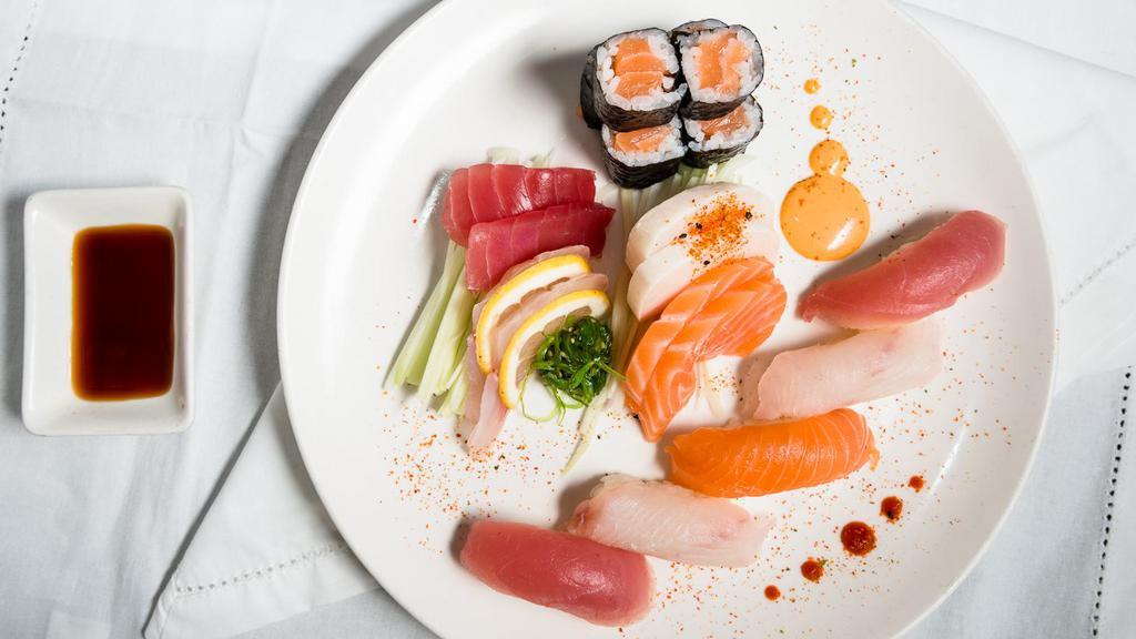 Sushi And Sashimi Combo · Eight pieces sashimi, five pieces sushi and California roll.