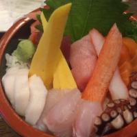 Chirashi · Assorted sashimi and vegetables over sushi rice.