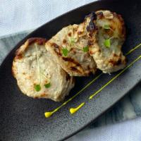 Murgh Reshmi Seekh · Five spiced minced chicken skewer and grilled.