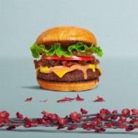 Your Own Vegan Burger · Seasoned vegan burger patty topped with your favorite choice of toppings!