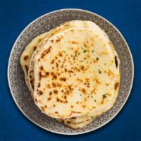 Garlic Gusto Naan  · Indian bread topped with garlic and cilantro, baked in a clay oven