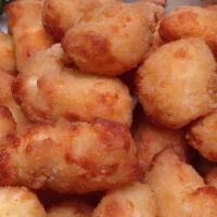 Cheese Curds · Wisconsin cheddar battered and fried. Honey chipotle dipping sauce