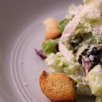 Caesar Salad · romaine, charred radicchio, dried blueberry, rosemary croutons, cured egg yolk, caesar dress...