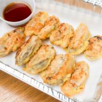 Pan Fried Oysters (10Pc) - 굴전 · Korean oysters pan-fried with jeon batter to order.