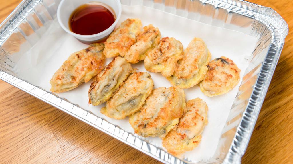 Pan Fried Oysters (10Pc) - 굴전 · Korean oysters pan-fried with jeon batter to order.
