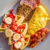 Breakfast Sampler · Our house style waffles served with 2 eggs, bacon, ham, sausage and golden hashbrowns