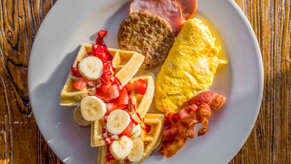 Breakfast Sampler · Our house style waffles served with 2 eggs, bacon, ham, sausage and golden hashbrowns