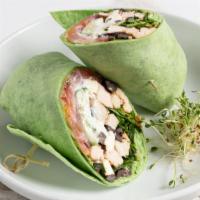 Greek Wrap · Grilled chicken, feta cheese, olives, lettuce, tomato, onions, cucumbers and tzatziki sauce ...