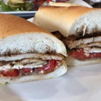 Santa Fe · Grilled Chicken/ fresh mozzarella/ roasted red peppers/ balsamic/ long roll.