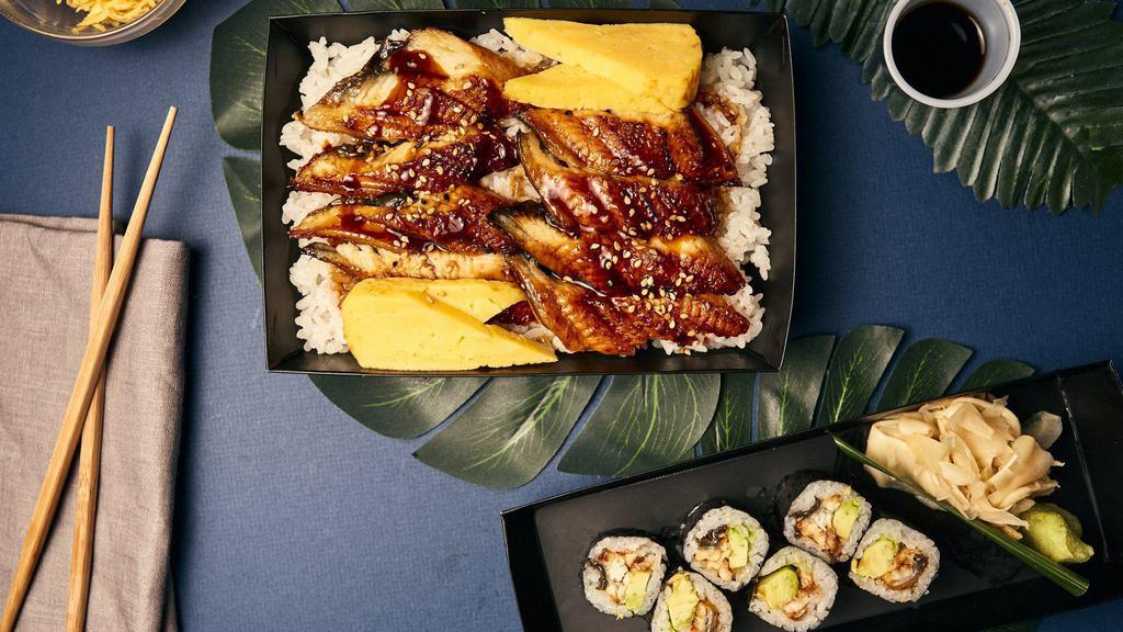 Unagi Don · grilled freshwater eel on a bed of white rice garnished with sesame seed, tamago, and daikon. comes with nigiri soy, wasabi, and white ginger.