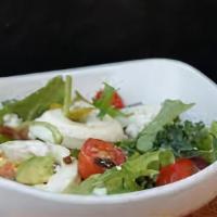 Dylan · Lettuce, tomato, mozzarella, extra virgin olive oil.