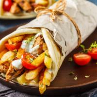 Jerk Chicken Gyro · Spicy, smokey and tender, our jerk chicken gyro is wrapped in your choice of pita or served ...