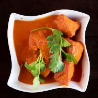 Chicken Tikka Masala · Cooked in tomato and cream sauce. Served with basmati rice.