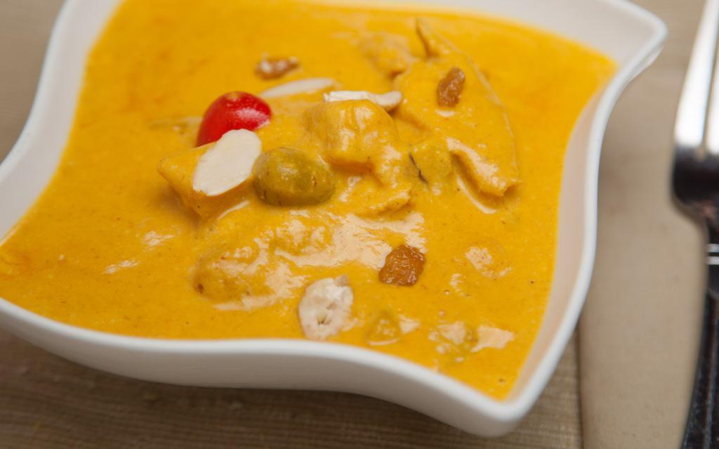 Chicken Korma · Supremes in rich cashew nut and almond cream sauce. Served with basmati rice.