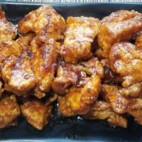 Popcorn Chicken · Boneless chicken with spicy sauce or mild sauce.