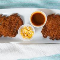 Donkatsu · Pork cutlet with corn salad and steamed white rice.  Add cheese ,curry for an additional cha...