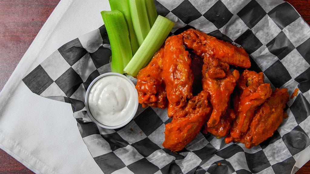 Buffalo Wings · Nine wings in your choice of signature sauce celery and Bleu cheese.