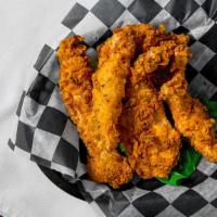 Homemade Chicken Fingers · Served with honey mustard or tossed in a signature sauce.
