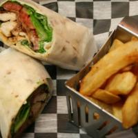 Grilled Chicken Wrap · grilled chicken, swiss, bacon, garlic aioli, tomatoes, and onion