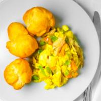 Ackee & Codfish Breakfast Meal · Jamaica's national dish ackee fruit sautéed with codfish, onions, and peppers.