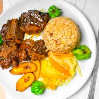 Oxtail Meal · Most popular item. Served with rice and cabbage.
