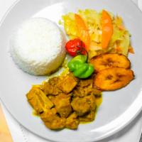 Curry Goat Meal · Mutton cooked in curry with peppers and onions.