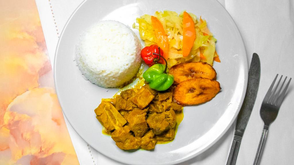 Curry Goat Meal · Mutton cooked in curry with peppers and onions.