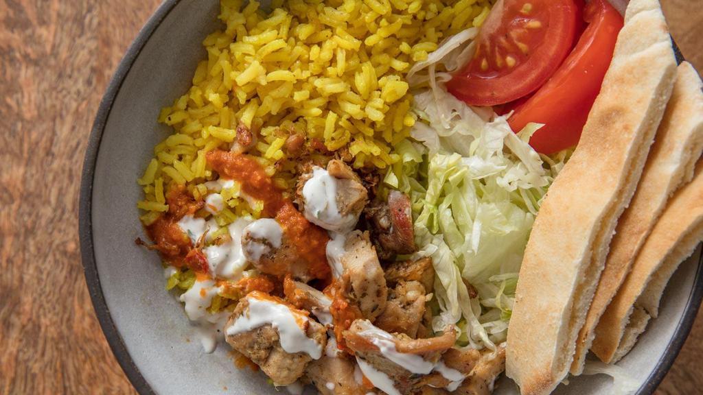Chicken Over Rice · Halal, spicy. Halal Chicken cooked with tasty flavors and served over rice with your choice of white sauce, hot sauce, and salad.