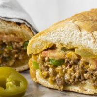 Vegan Chopped Cheese · Vegan. **New** Chopped Beyond Burger with your choice of cheese, onions ,peppers tomato, let...