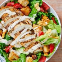 Chicken Caesar Salad · Comes with grilled chicken of your choice, Parmesan cheese, romaine lettuce, croutons, cucum...