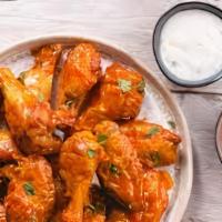 Chicken Wings · Your choice of hot wings, buffalo glazed wings, regular chicken wings, or sweet and spicy ch...