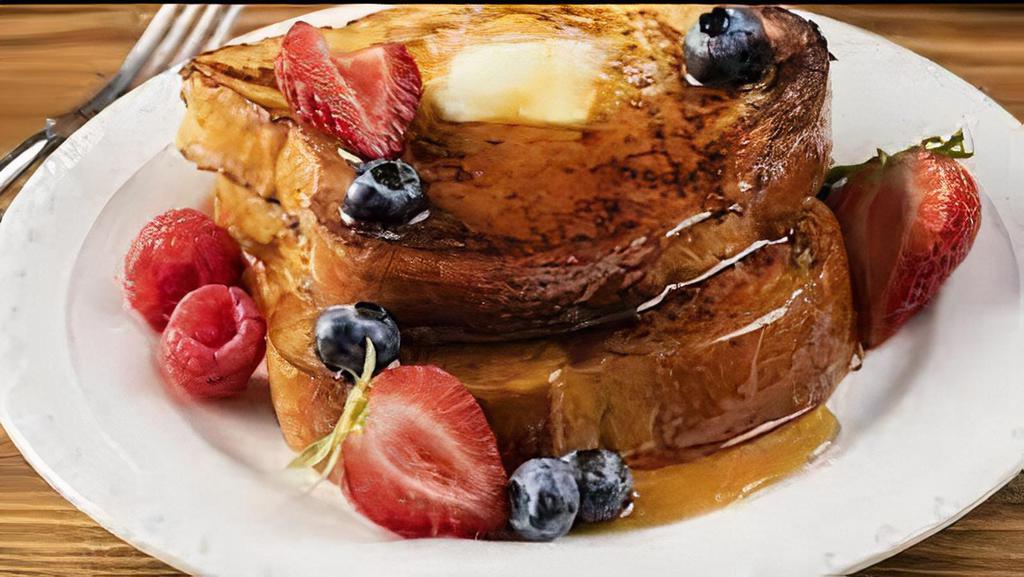 French Toast (3 Pcs) · French toast with cinnamon served with syrup.