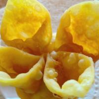 9) Crab Rangoon · Imitation crab, cream cheese mixed with herbs in a wonton wrapper deep fried. Served with pl...