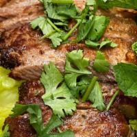 18) Crying Tiger (New York Steak) · Grilled New York steak Thai herb marinade, turned frequently until desired doneness is reach...