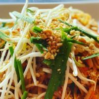 24) Pad Thai · Rice noodle stir fried with egg, bean sprouts, Chinese chives (Chinese onion) ground peanut ...