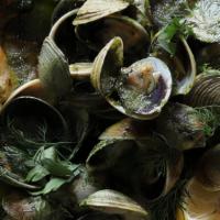 Manila Clams · Manila clams,  garlic and parsley sauce, fresh herbs, grilled country bread