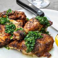 Half Roasted Chicken · Half chicken roasted with ibérico lard, lemon, herbs and salsa Verde (serves two with the ad...