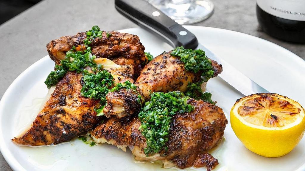 Half Roasted Chicken · Half chicken roasted with ibérico lard, lemon, herbs and salsa Verde (serves two with the addition of tapas).