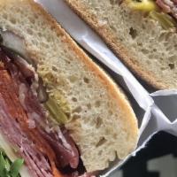 Sweet Sub · Honey ham or honey turkey, white American cheese, tomato, shredded romaine, banana peppers a...