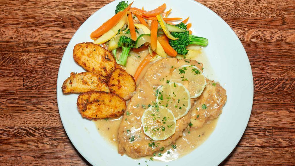 Chicken Francese · Lightly battered and sautêed in a lemon and white wine sauce. Served with potato and vegetables.