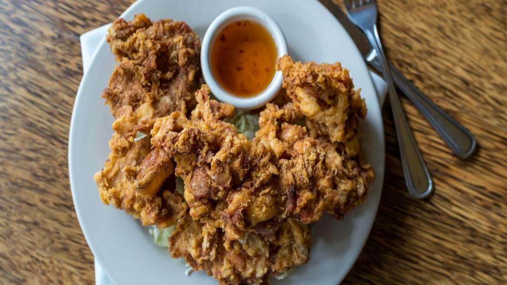 Thai Crispy Fried Chicken · Chicken marinated in minced lemon grass, Thai spices, and then fried.