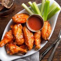 12 Wings  · please specify: plain, or sauce on it with: BBQ, Buffalo, Thai Sweet Chili sauce.