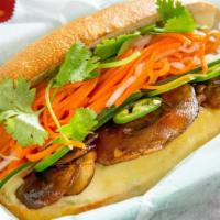 Smoked Mushroom Bánh Mì · house grown mushroom, havarti cheese, basil, and peanut pesto sauce. Made with mayo, cucumbe...