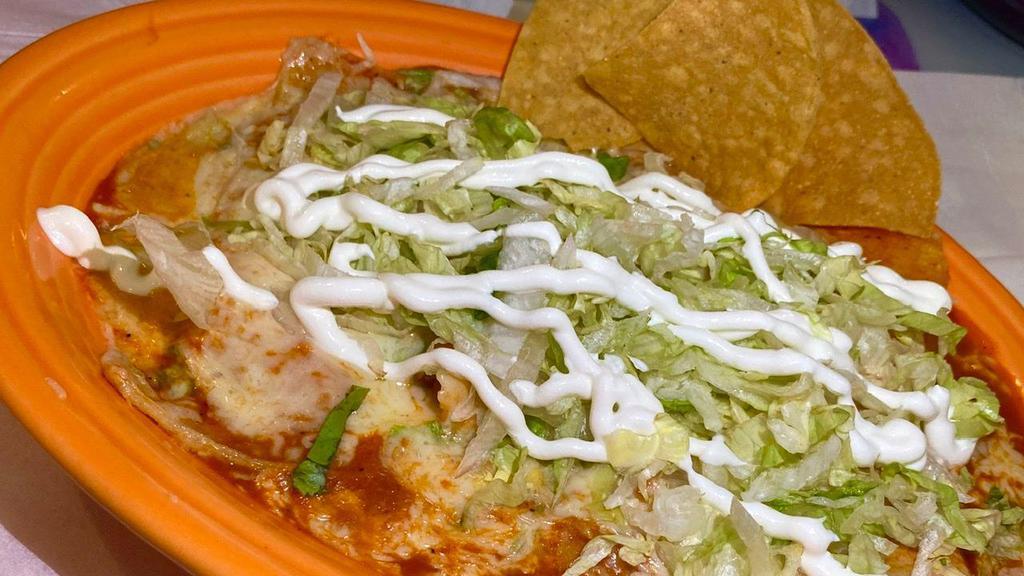 Supremas · A delicious combination of four corn enchiladas, one shredded chicken, one ground beef, one bean, and one cheese, topped with enchilada sauce, lettuce, and sour cream.