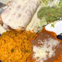La Changa · 12-inch flour tortilla folded and deep fried or soft filled with refried beans  your choice ...