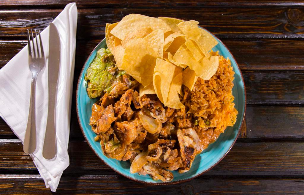 Panchos Special · Grilled shrimp, chicken, and onions, topped with shredded cheese. Served with rice, refried beans, and guacamole salad.