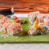 Snow Mountain Roll · Shrimp, tempura, cucumber inside, topped with crab meat, spicy mayo and snow mountain sauce.